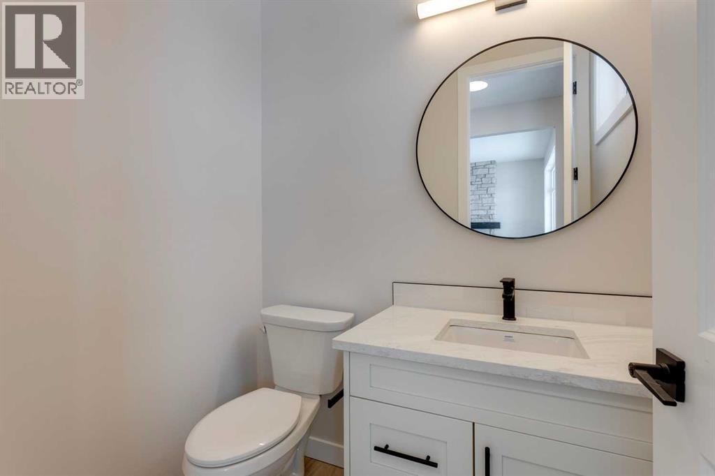 105 Cottageclub Drive, Rural Rocky View County, Alberta  T4C 1B1 - Photo 2 - A2266824