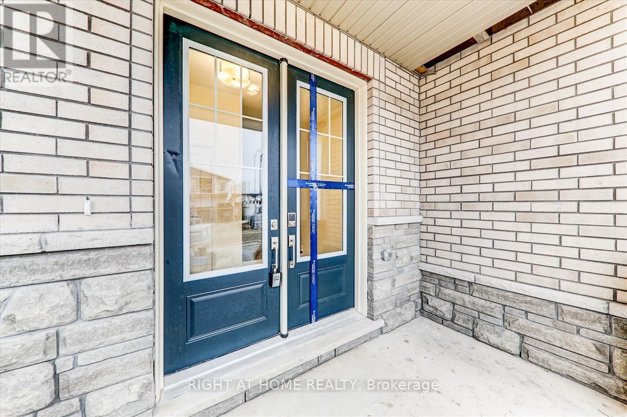 9 Sweet Cicely Street, Springwater, Ontario  L9X 2E2 - Photo 2 - S12645594