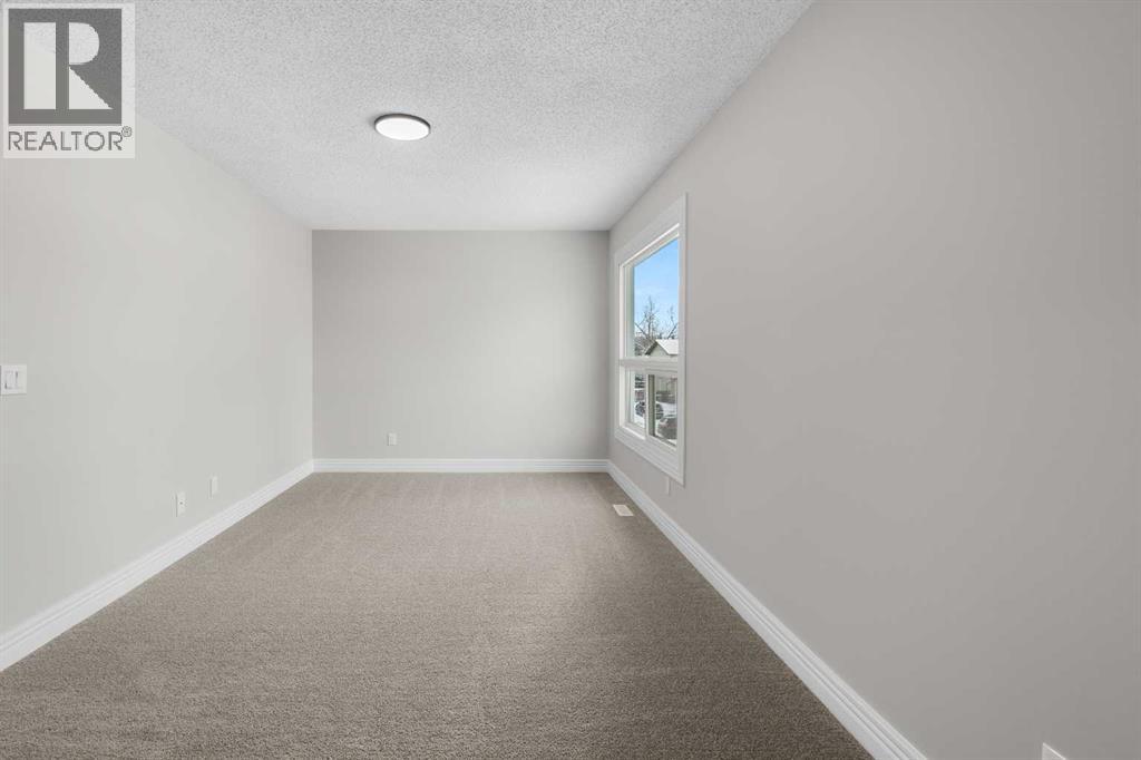 129 Deer Ridge Lane Se, Calgary, Alberta  T2J 6N3 - Photo 15 - A2274492