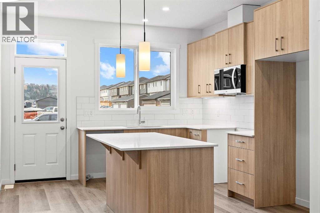 918 Creekside Boulevard Sw, Calgary, Alberta  T2X 5G8 - Photo 9 - A2268874