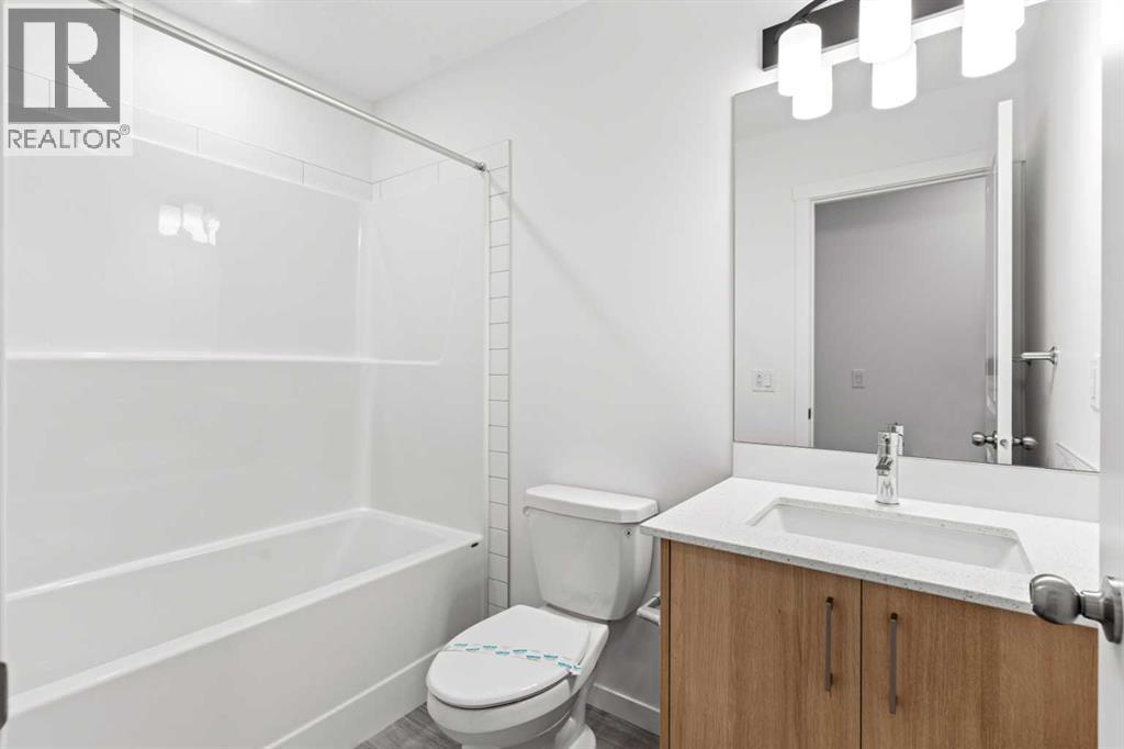 918 Creekside Boulevard Sw, Calgary, Alberta  T2X 5G8 - Photo 28 - A2268874