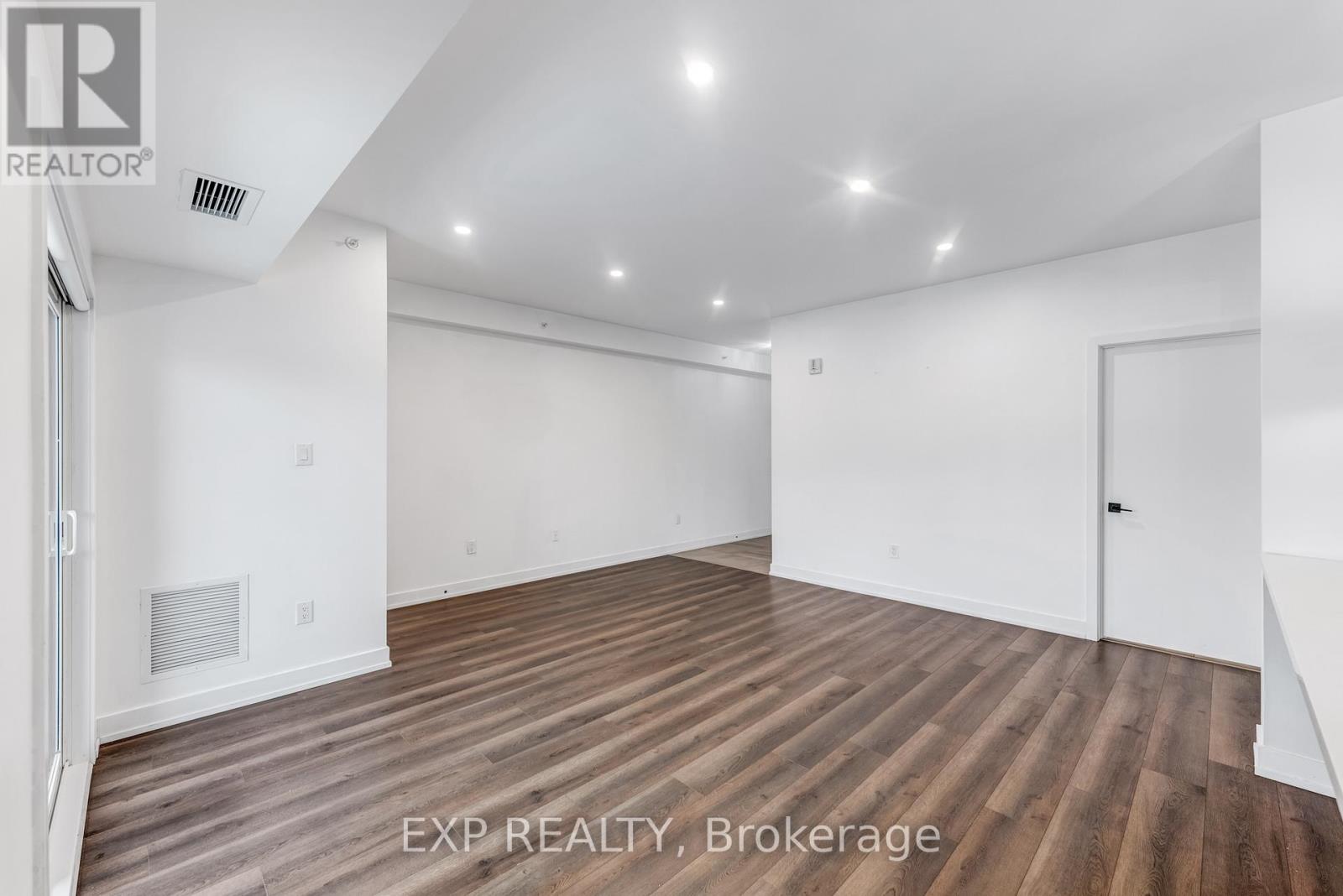 101 - 4 Spice Way, Barrie, Ontario  L9J 0M2 - Photo 8 - S12645768