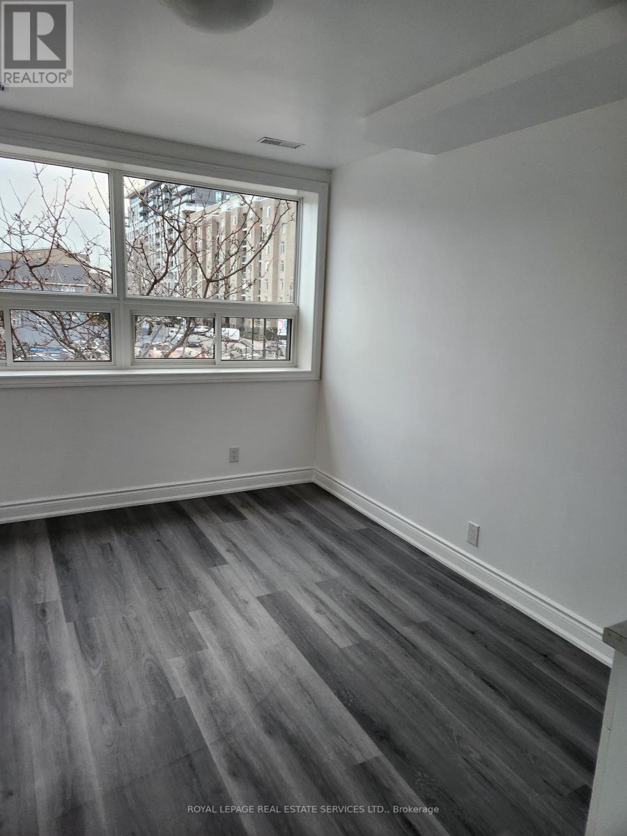 201 - 2820 Danfoth Avenue, Toronto, Ontario  M4C 1M1 - Photo 2 - E12636958