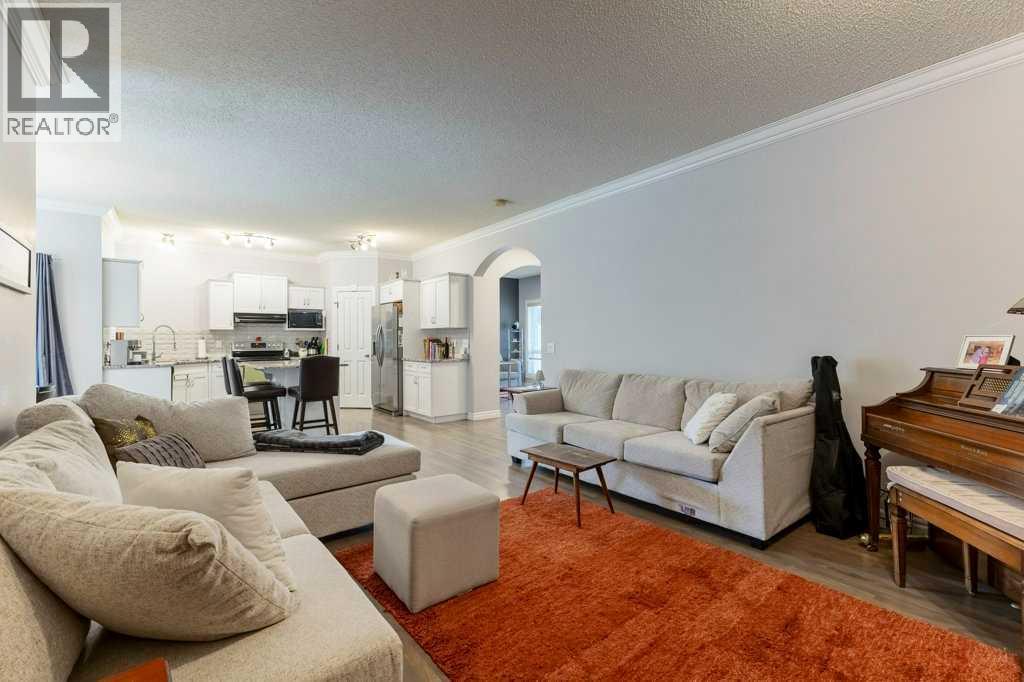 540 Panatella Court Nw, Calgary, Alberta  T3K 5Z7 - Photo 4 - A2255456