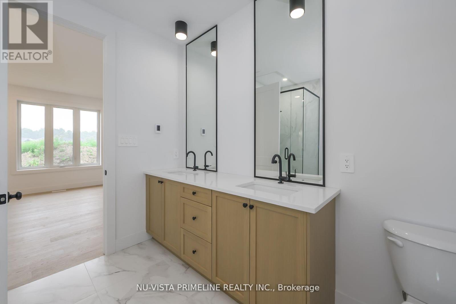 186 Timberwalk Trail, Middlesex Centre, Ontario  N0M 2A0 - Photo 18 - X12646350