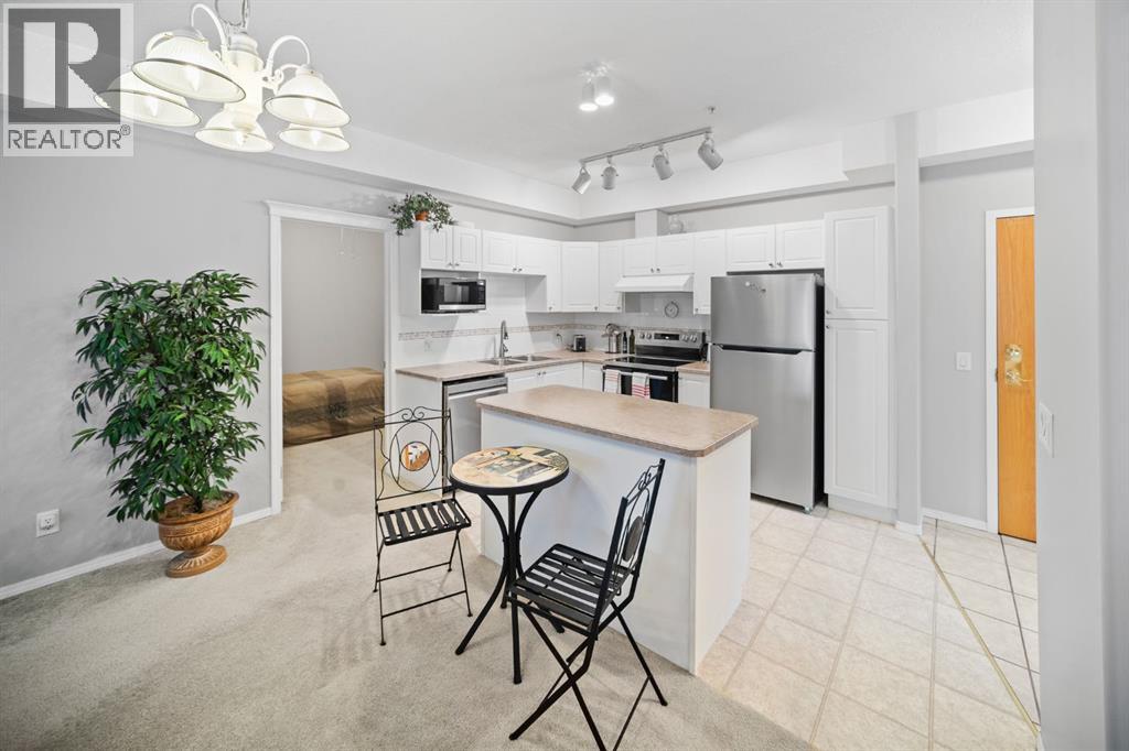 201, 223 Tuscany Springs Boulevard Nw, Calgary, Alberta  T3L 2M2 - Photo 5 - A2275694