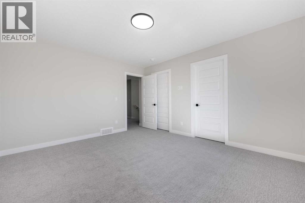 92 Waterford Manor, Chestermere, Alberta  T1X 2T9 - Photo 18 - A2233048