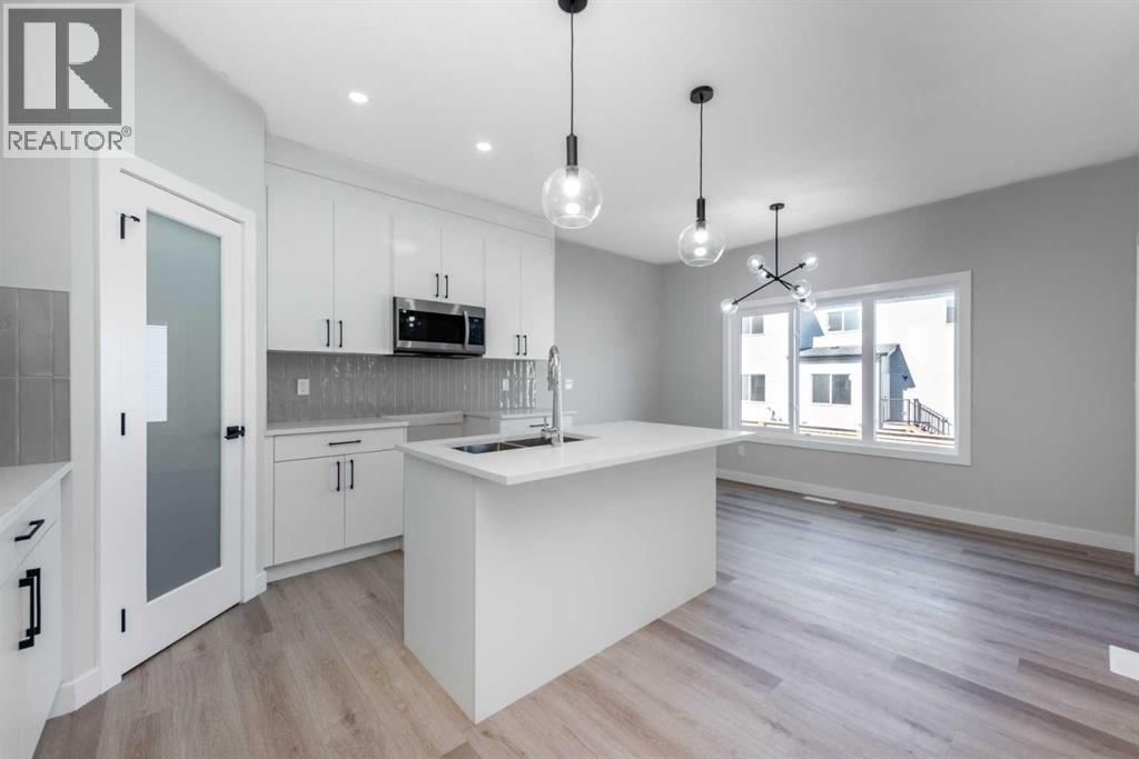 92 Waterford Manor, Chestermere, Alberta  T1X 2T9 - Photo 5 - A2233048