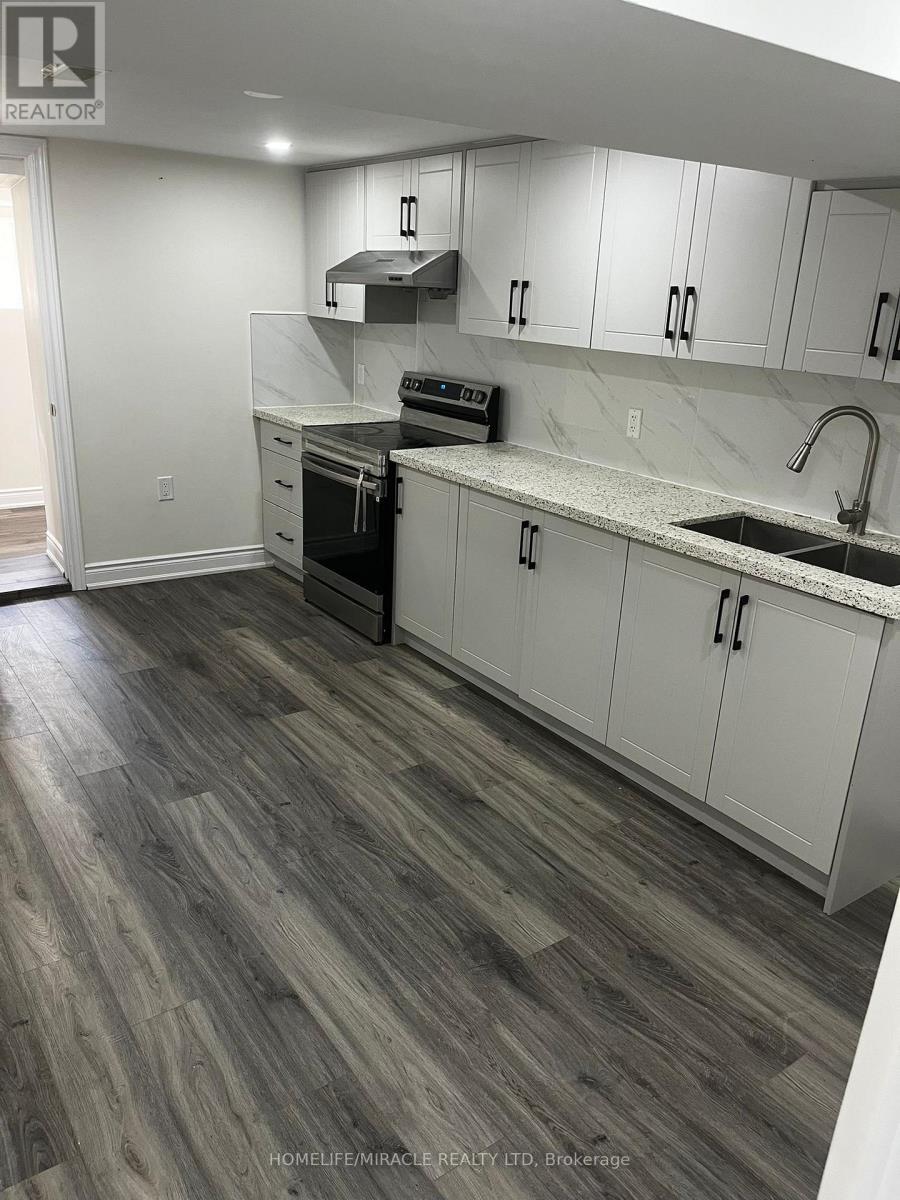 163 Gracedale Boulevard, Toronto, Ontario  M9L 2C2 - Photo 3 - W12646670