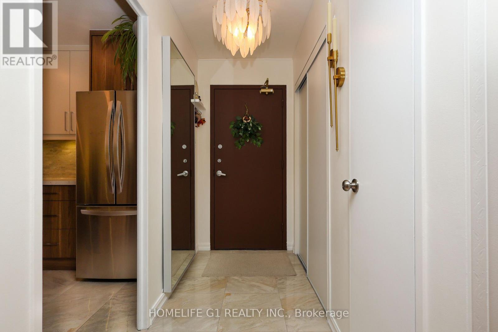 1203 - 44 Longbourne Drive, Toronto, Ontario  M9R 2M7 - Photo 2 - W12646880