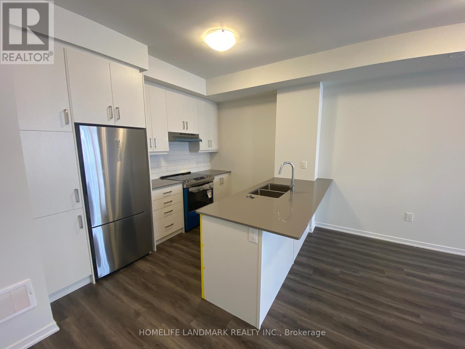 Th223 - 131 Honeycrisp Crescent, Vaughan, Ontario  L4K 0N7 - Photo 3 - N12647320