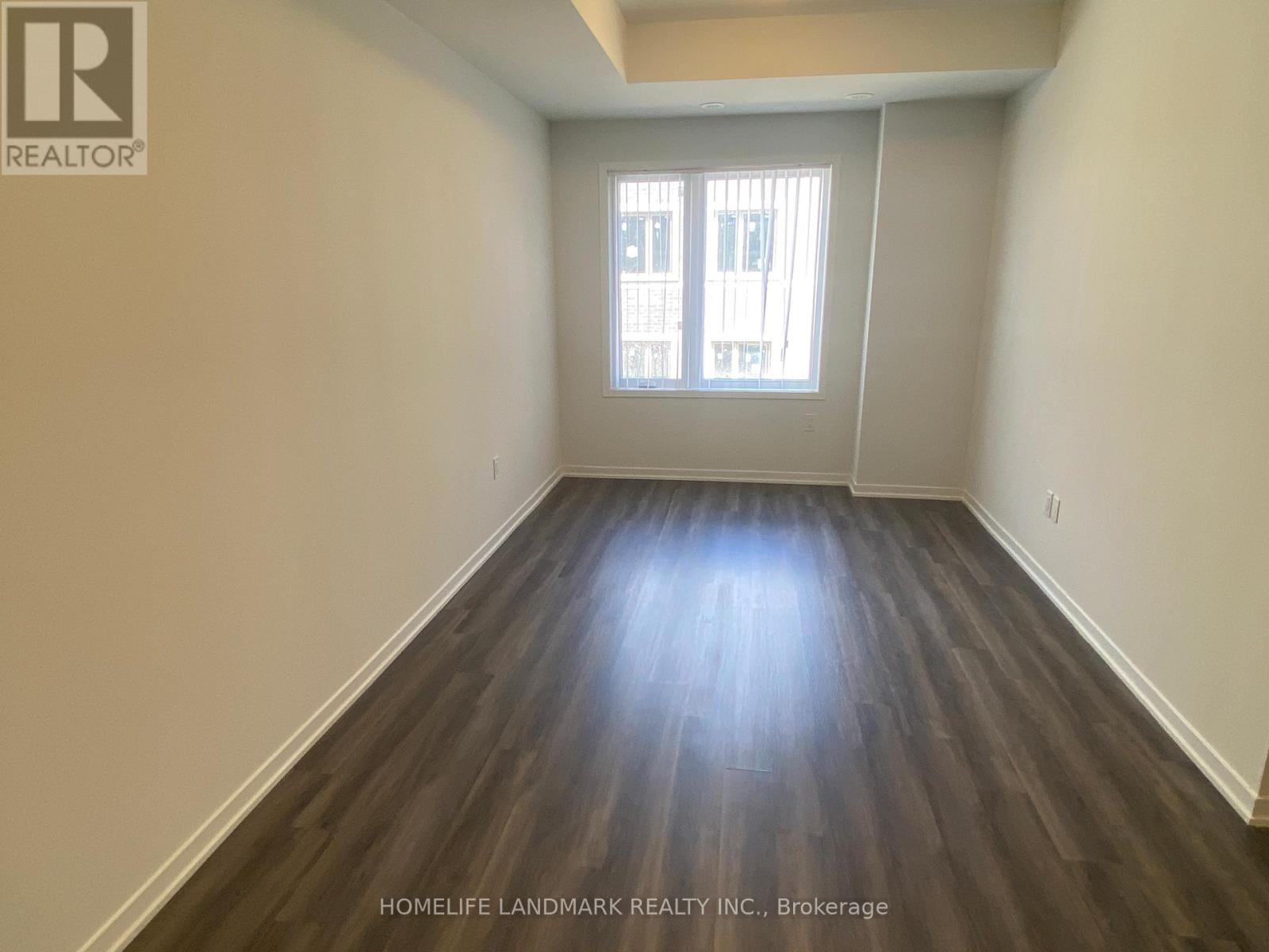 Th223 - 131 Honeycrisp Crescent, Vaughan, Ontario  L4K 0N7 - Photo 5 - N12647320