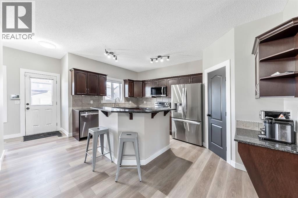 84 Cimarron Grove Close, Okotoks, Alberta  T1S 0H5 - Photo 9 - A2275647