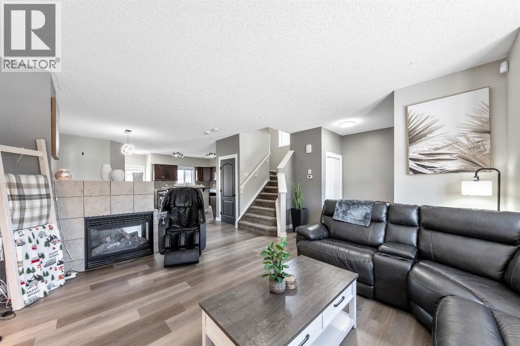 84 Cimarron Grove Close, Okotoks, Alberta  T1S 0H5 - Photo 5 - A2275647