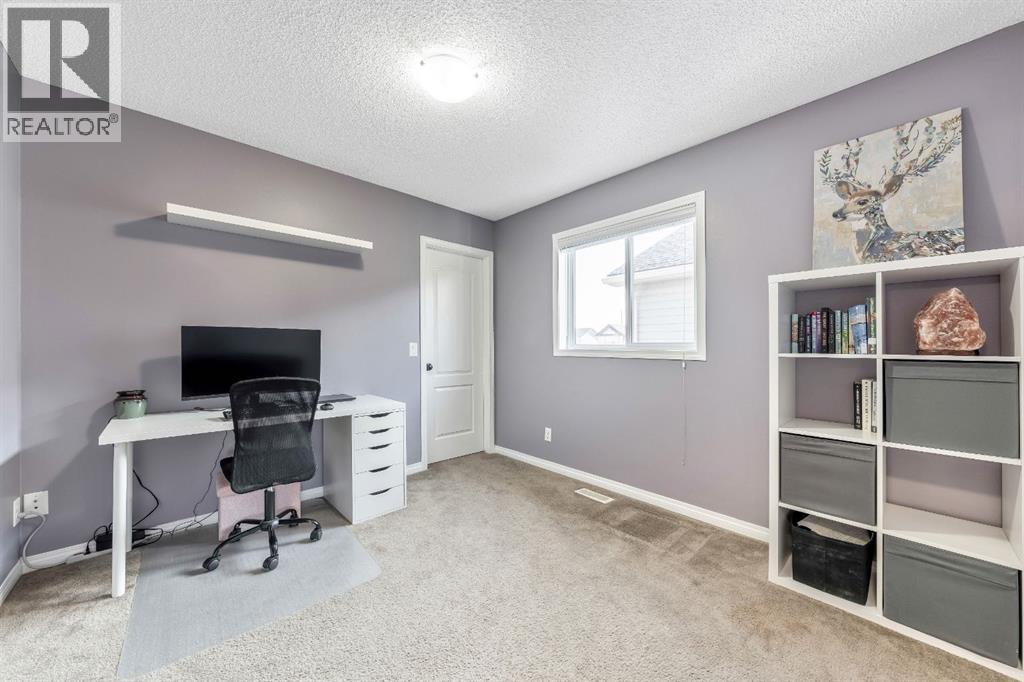 84 Cimarron Grove Close, Okotoks, Alberta  T1S 0H5 - Photo 19 - A2275647