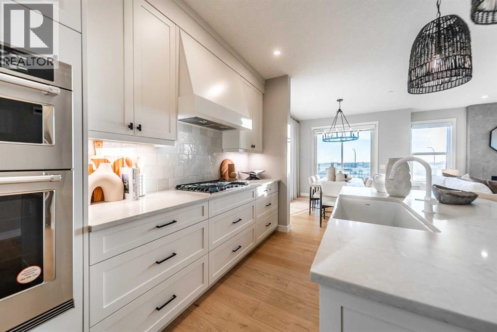 207 Lucas Common Nw, Calgary, Alberta  T3P 2B3 - Photo 5 - A2254552