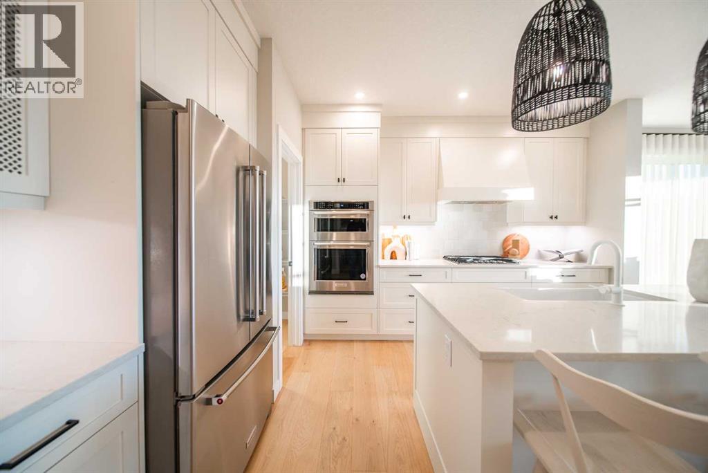 207 Lucas Common Nw, Calgary, Alberta  T3P 2B3 - Photo 4 - A2254552