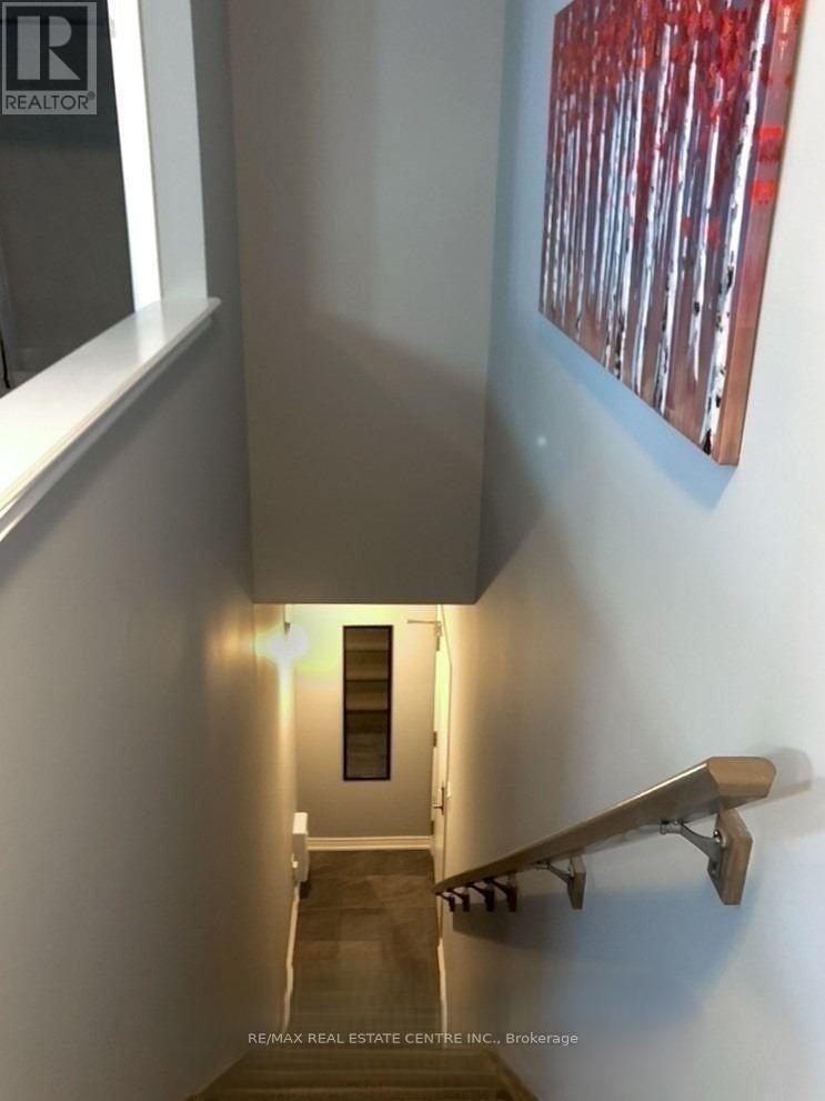 208 - 263 Georgian Drive, Oakville (Ro River Oaks), Ontario  L6H 0L2 - Photo 12 - W12647816