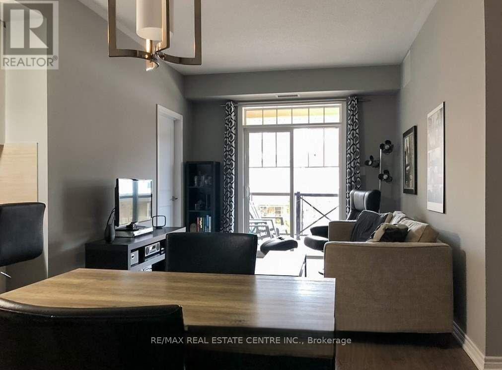 208 - 263 Georgian Drive, Oakville (Ro River Oaks), Ontario  L6H 0L2 - Photo 2 - W12647816