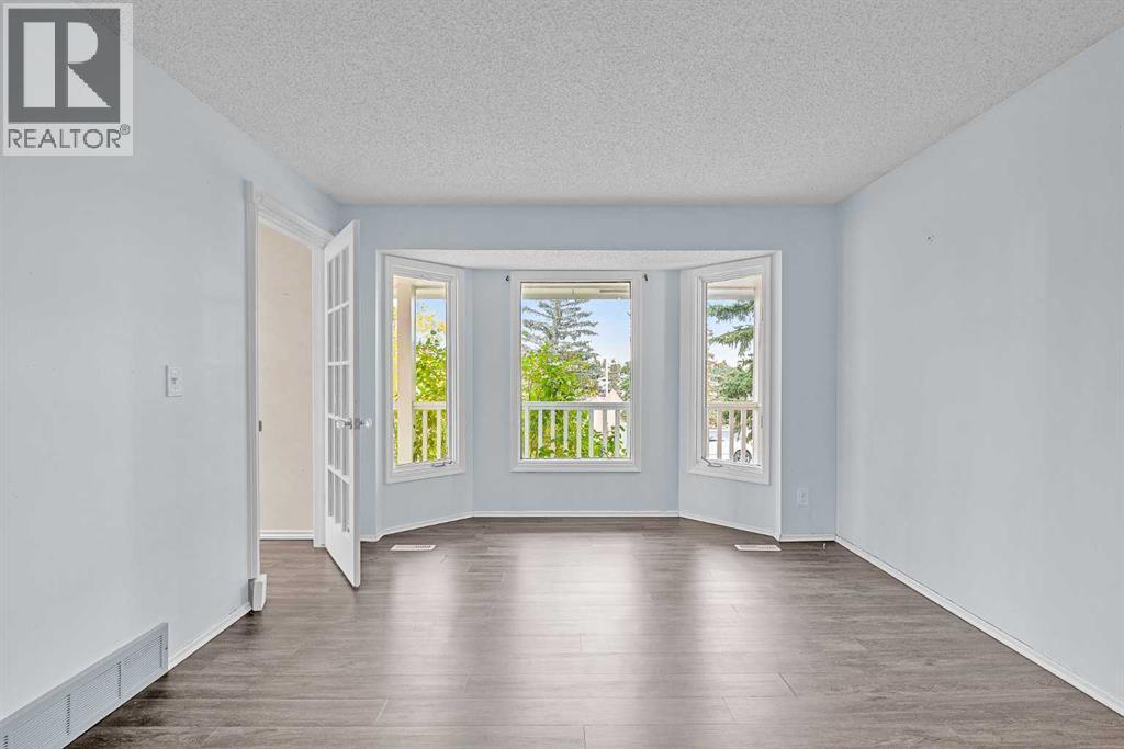 147 Scenic Way Nw, Calgary, Alberta  T3L 1B6 - Photo 5 - A2262120