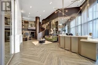 630 - 395 Dundas Street W, Oakville, Ontario  L6M 4M2 - Photo 2 - W12648236