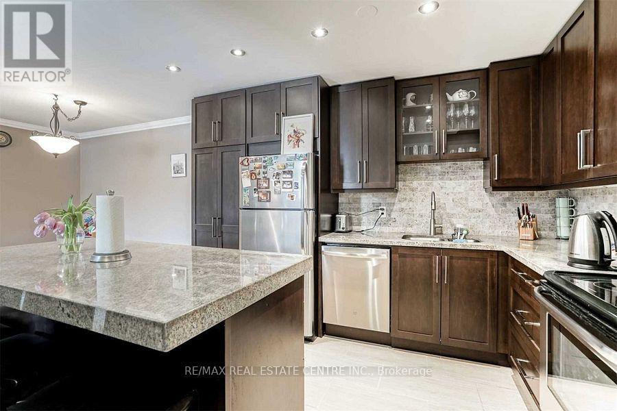 1123 - 1450 Glen Abbey Gate, Oakville, Ontario  L6M 2V7 - Photo 10 - W12648342