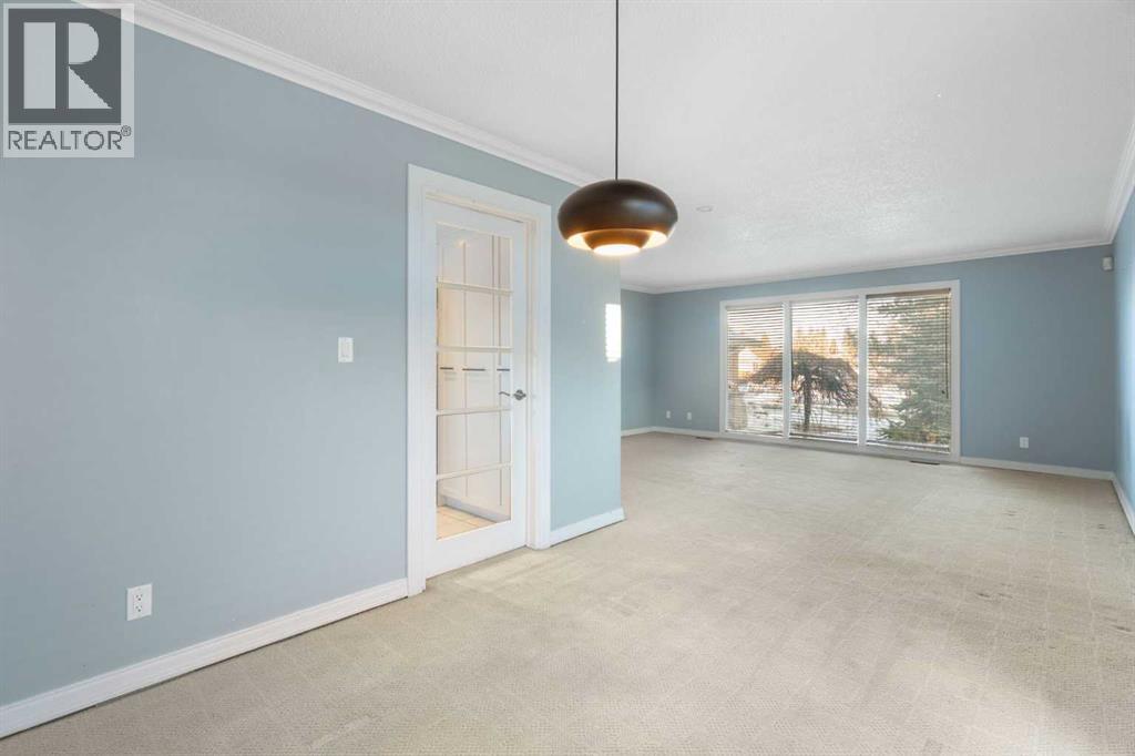 1447 Acadia Drive Se, Calgary, Alberta  T2J 5B1 - Photo 9 - A2275400