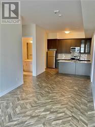 512 - 150 Oak Park Boulevard, Oakville, Ontario  L6H 3P2 - Photo 3 - W12648858