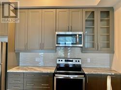 512 - 150 Oak Park Boulevard, Oakville, Ontario  L6H 3P2 - Photo 5 - W12648858