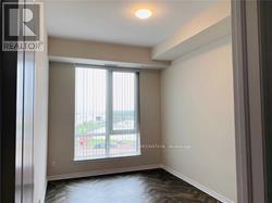 512 - 150 Oak Park Boulevard, Oakville, Ontario  L6H 3P2 - Photo 7 - W12648858