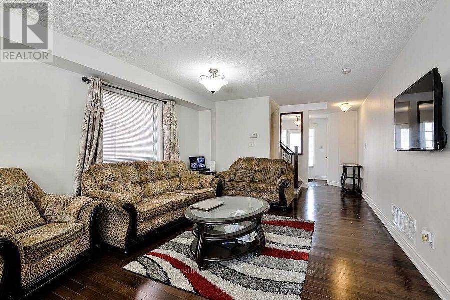 84 Tideland Drive, Brampton, Ontario  L7A 2W1 - Photo 4 - W12648924