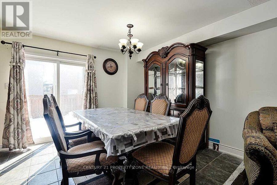 84 Tideland Drive, Brampton, Ontario  L7A 2W1 - Photo 5 - W12648924