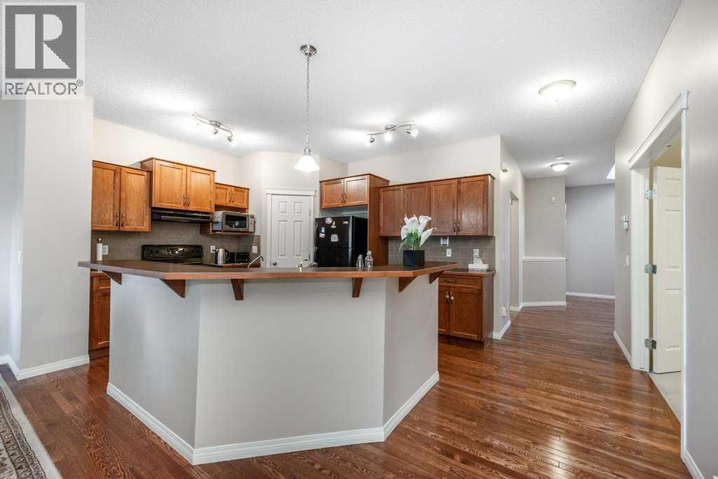 1119 Panamount Boulevard Nw, Calgary, Alberta  T3K 0J7 - Photo 7 - A2275917