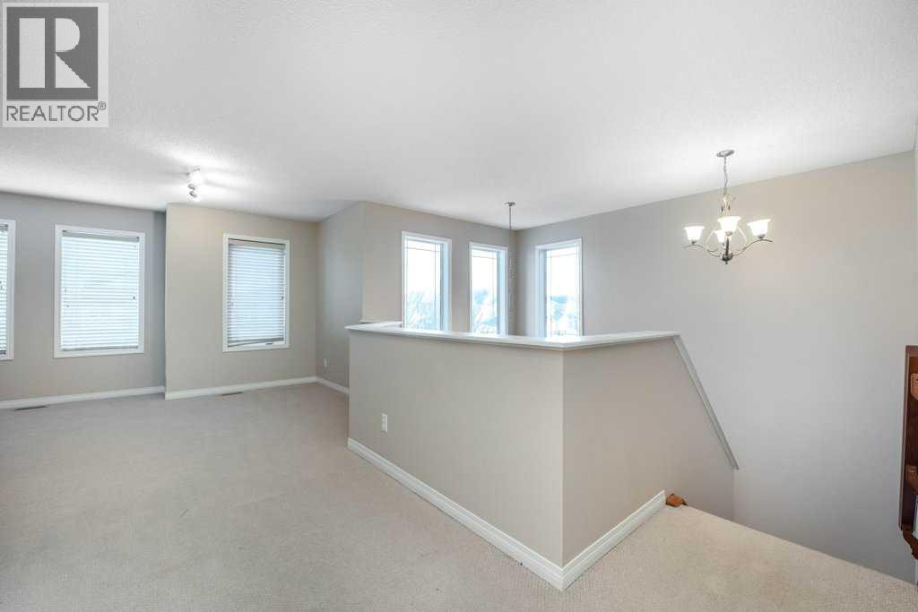 1119 Panamount Boulevard Nw, Calgary, Alberta  T3K 0J7 - Photo 15 - A2275917