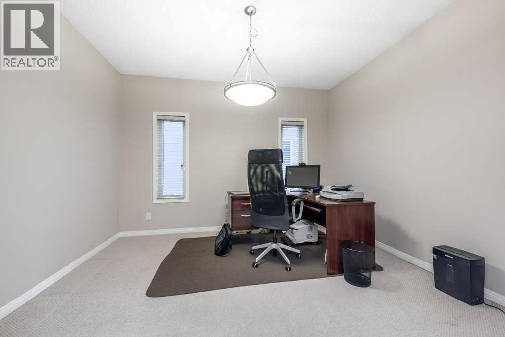 1119 Panamount Boulevard Nw, Calgary, Alberta  T3K 0J7 - Photo 11 - A2275917