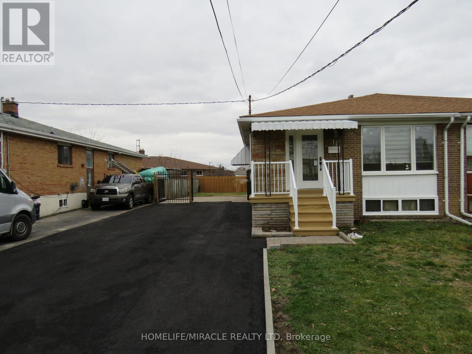 18 Rubydale Gardens, Toronto, Ontario  M9L 1B9 - Photo 2 - W12649512