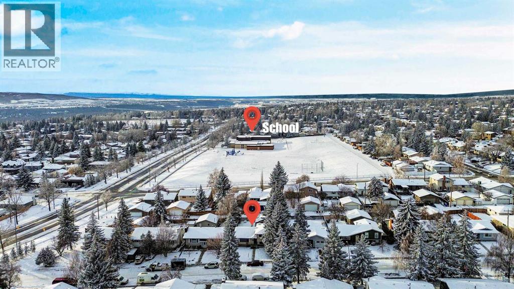 107 Silver Brook Drive Nw, Calgary, Alberta T3B 3H6 - Photo 5 - A2274311