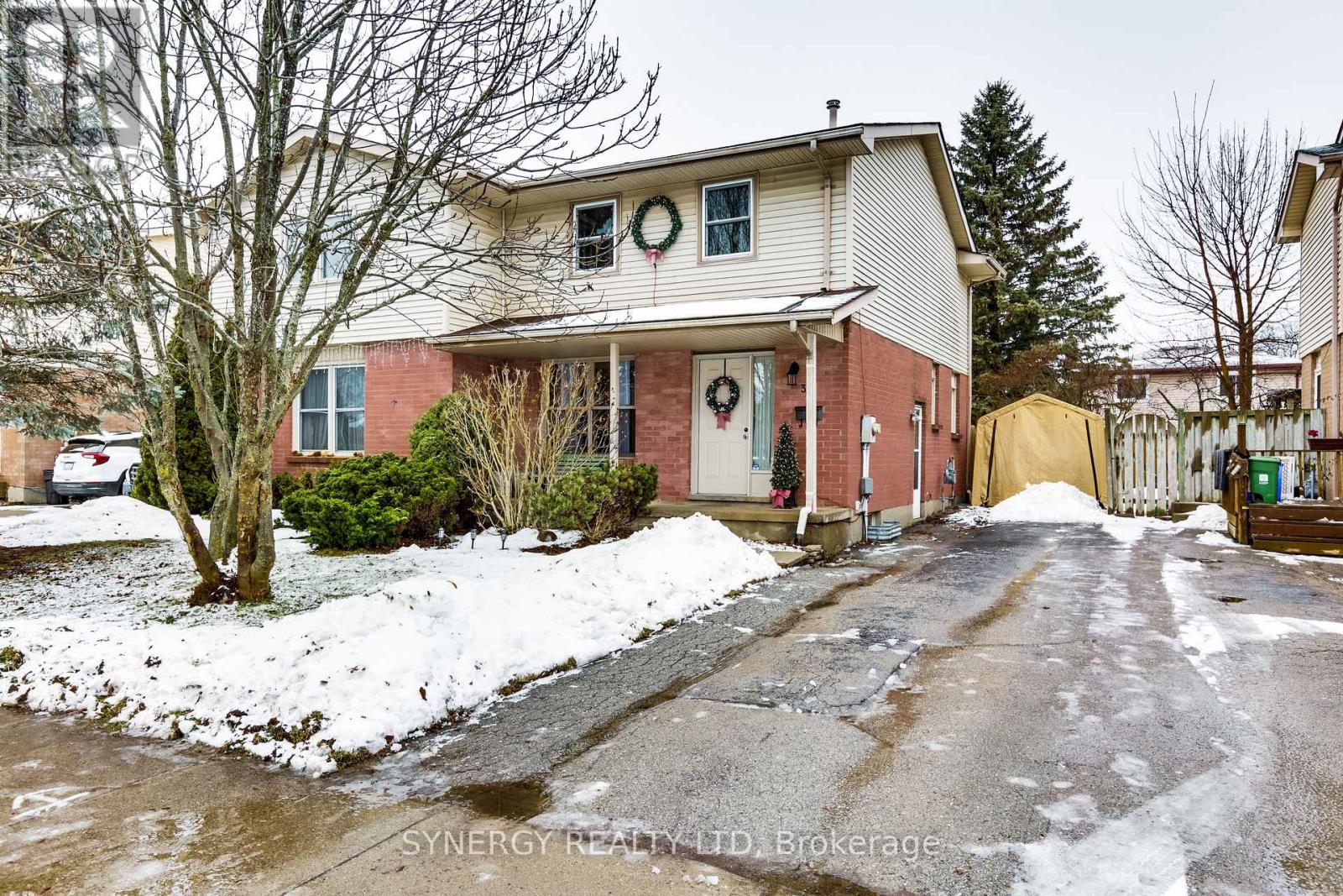 <div class="slider-price">$489,900</div><p>346 Crawford Street, London South, Ontario</p>
