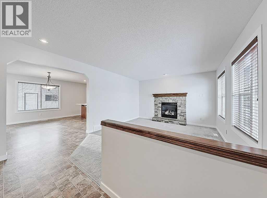 409 Cimarron Boulevard, Okotoks, Alberta  T1S 0A9 - Photo 5 - A2269381