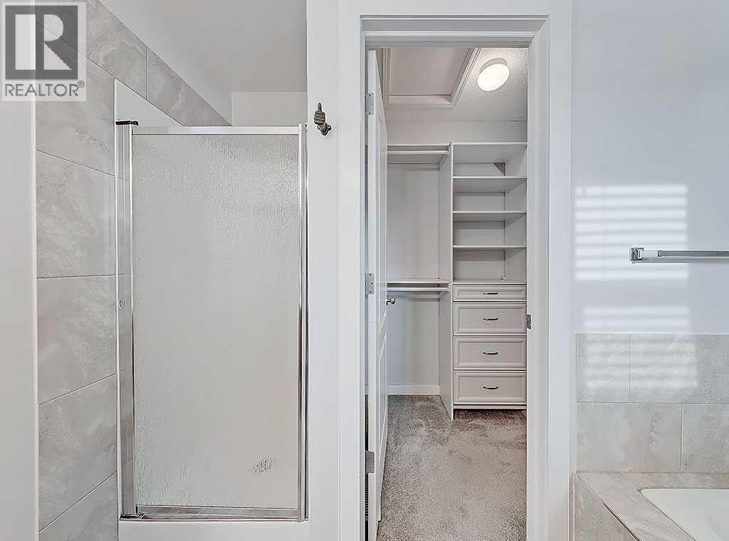 409 Cimarron Boulevard, Okotoks, Alberta  T1S 0A9 - Photo 20 - A2269381