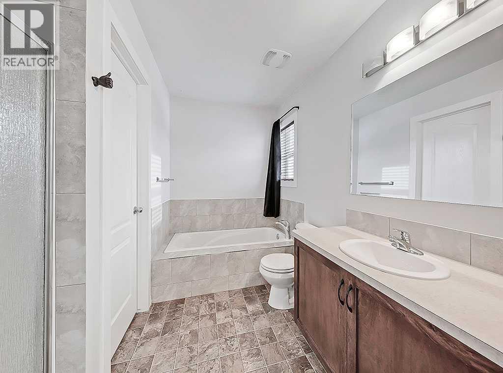 409 Cimarron Boulevard, Okotoks, Alberta  T1S 0A9 - Photo 17 - A2269381