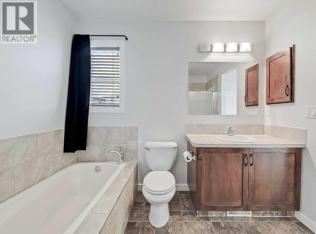 409 Cimarron Boulevard, Okotoks, Alberta  T1S 0A9 - Photo 22 - A2269381