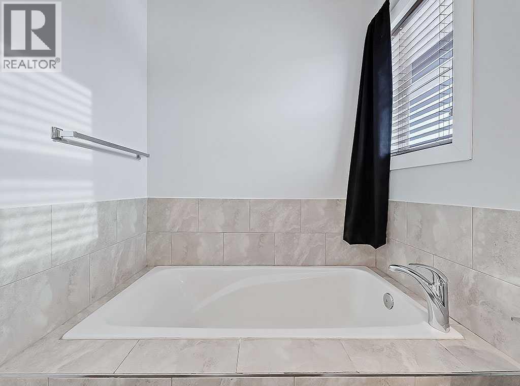 409 Cimarron Boulevard, Okotoks, Alberta  T1S 0A9 - Photo 18 - A2269381