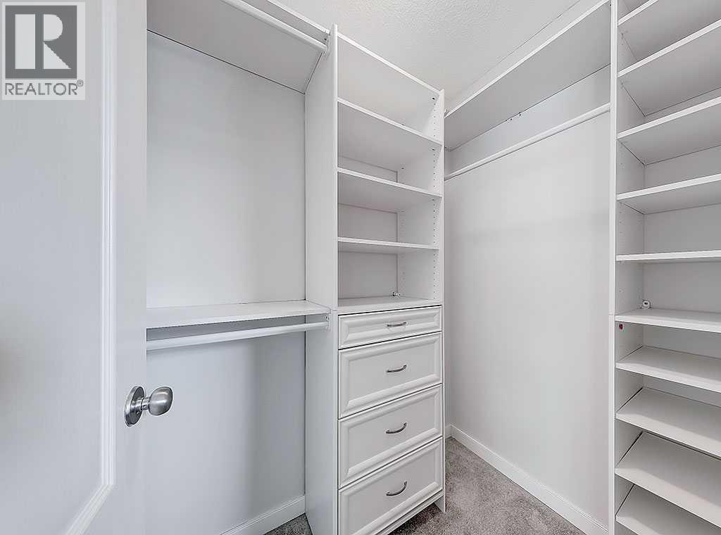 409 Cimarron Boulevard, Okotoks, Alberta  T1S 0A9 - Photo 21 - A2269381