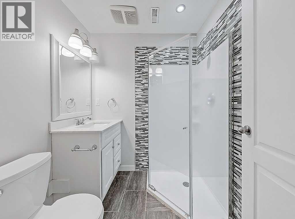 409 Cimarron Boulevard, Okotoks, Alberta  T1S 0A9 - Photo 31 - A2269381