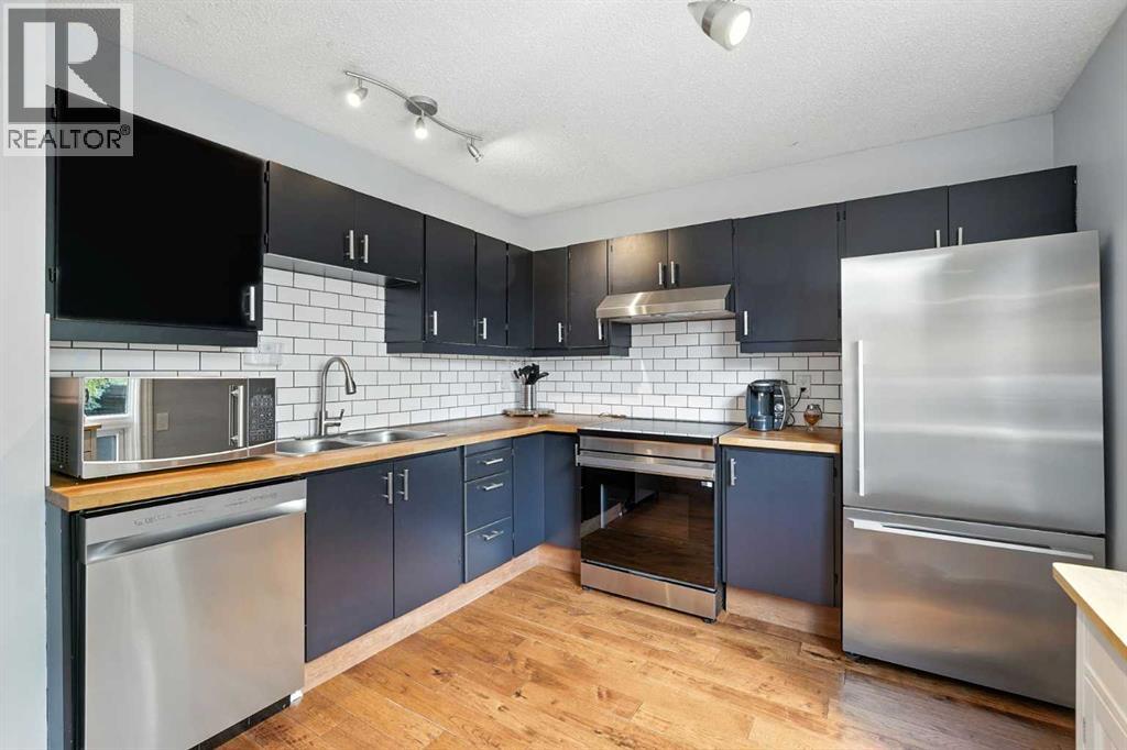 123 Silverstone Road Nw, Calgary, Alberta  T3B 4Y6 - Photo 12 - A2260070