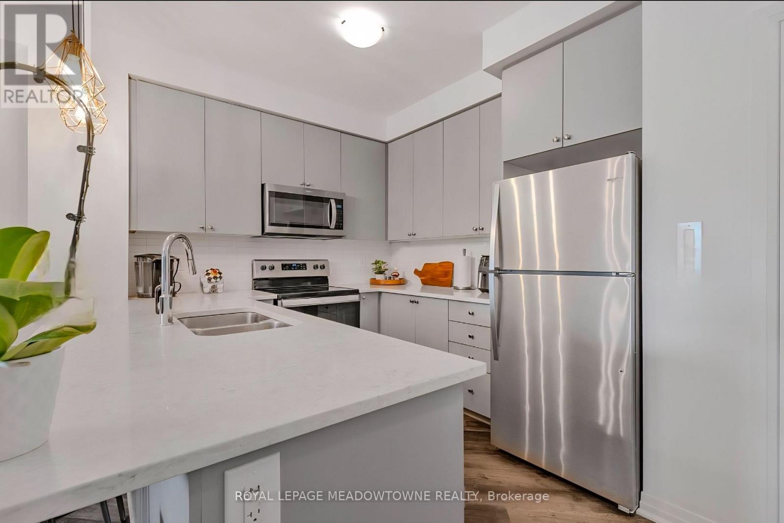 324 - 610 Farmstead Drive, Milton, Ontario  L9T 8X5 - Photo 11 - W12650296