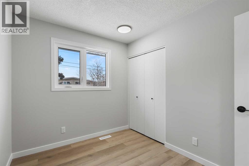 7512 Hunterfield Road Nw, Calgary, Alberta  T2K 4L1 - Photo 18 - A2275257