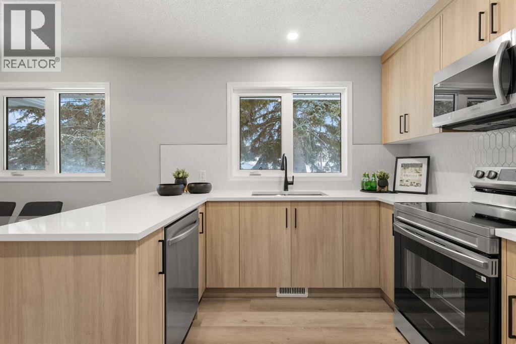 7512 Hunterfield Road Nw, Calgary, Alberta  T2K 4L1 - Photo 1 - A2275257