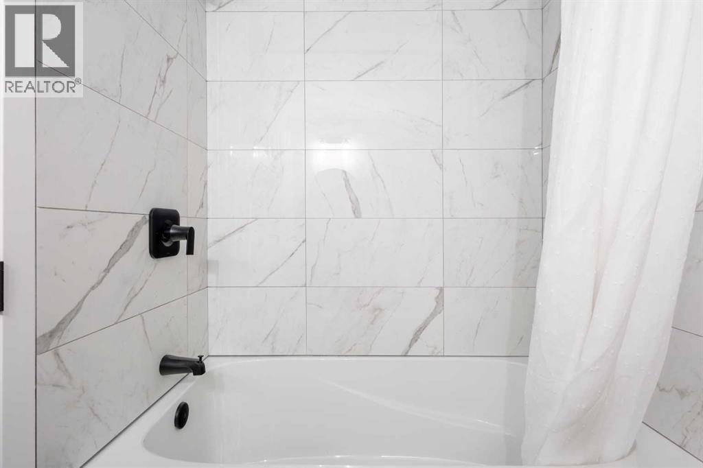 7512 Hunterfield Road Nw, Calgary, Alberta  T2K 4L1 - Photo 32 - A2275257